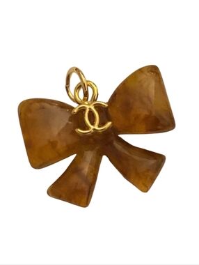 Vintage CHANEL A25 Bow Charm Marbled Tortoiseshell Resin Gold Lagerfeld Era